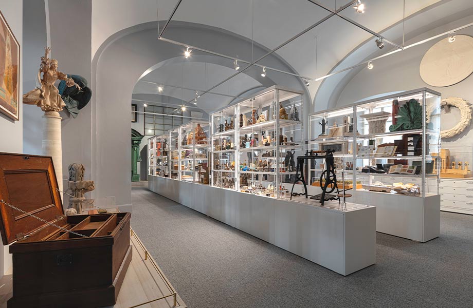 Display at the National Building Museum featuring shelves of building materials including Formica Brand products