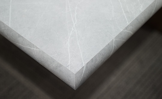 Conference room with materials 7402 Pietra Grafite 180fx® HPL Laminate and IdealEdge® Decorative Edging