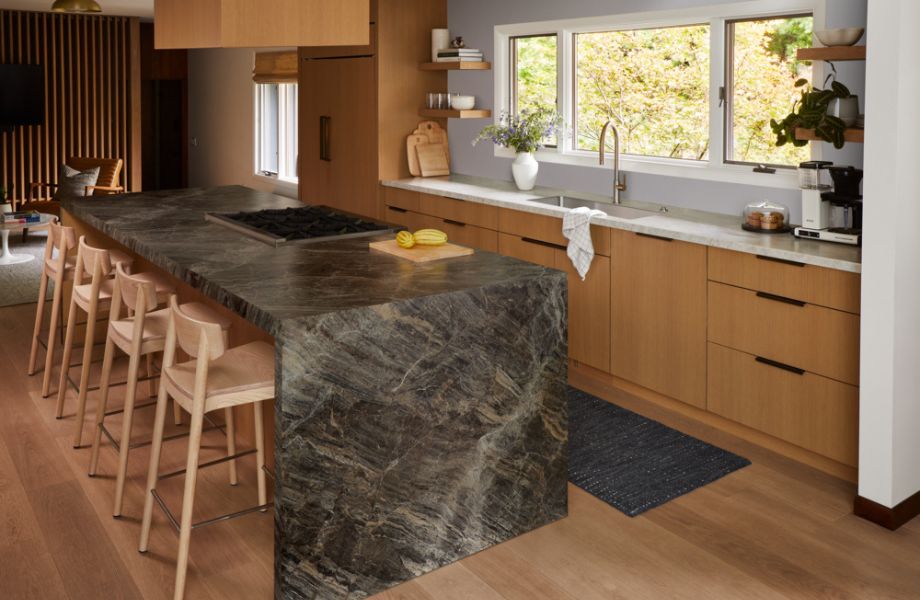 Waterfall kitchen island in Jatoba Brown and kitchen countertop in Taj Mahal